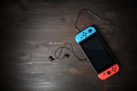 Il est possible de brancher la Nintendo Switch sur un téléviseur afin de bénéficier d’une qualité d’image largement supérieure. © Veresovitch, Adobe Stock